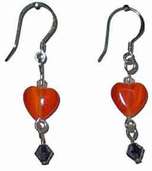 Heart earrings in orange and black
